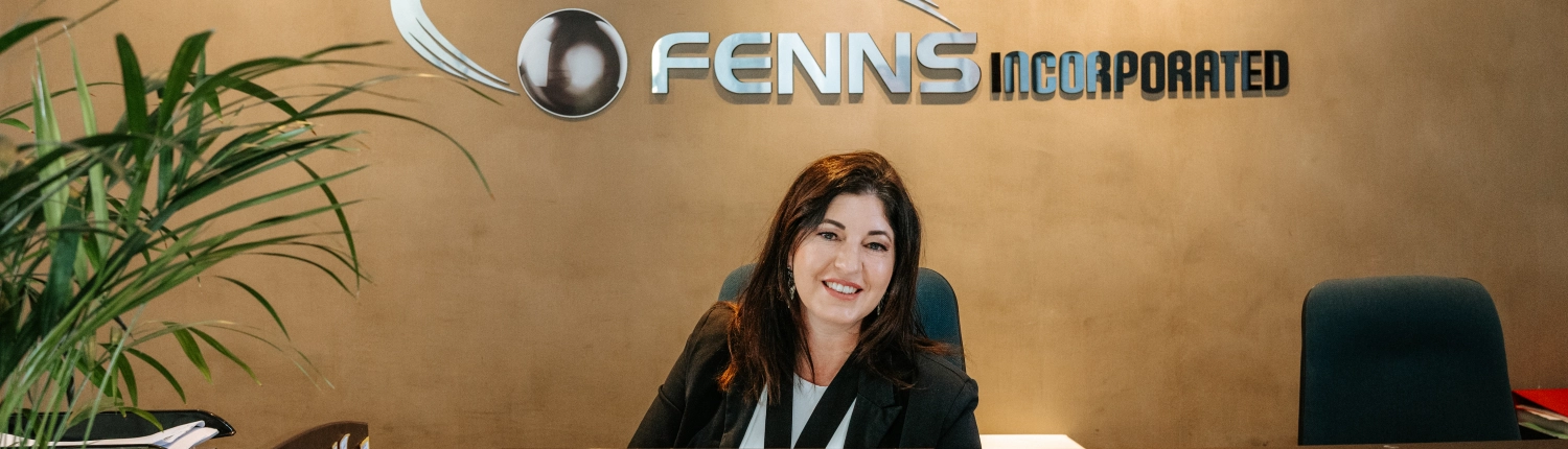 San-Marie Sitting at the Reception desk